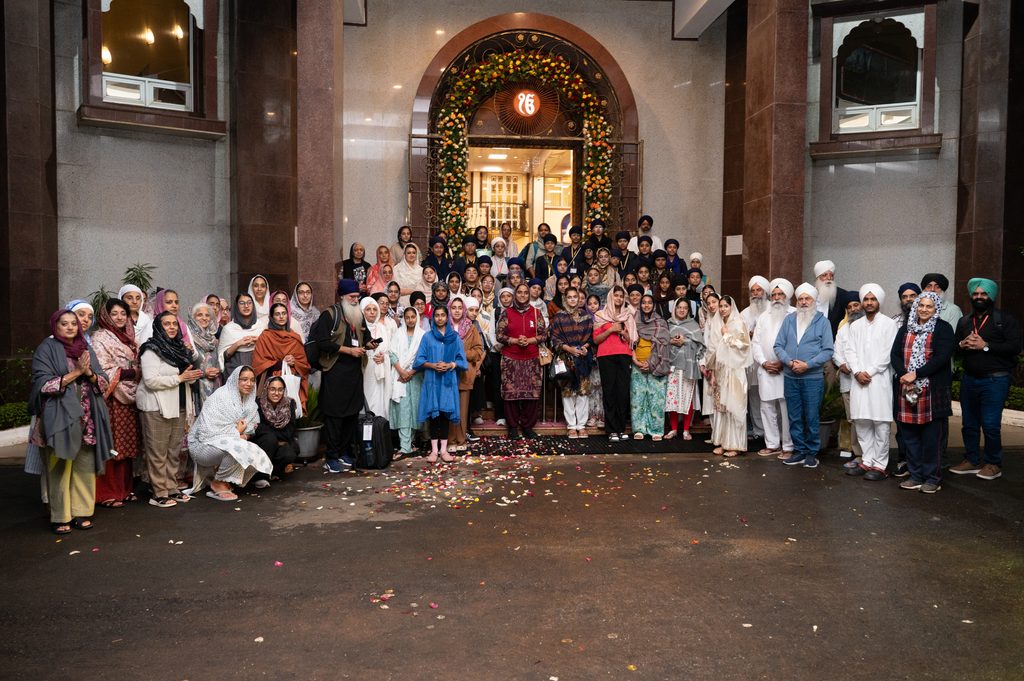 Retreat participants and support sewadars outside the main doors to the GNNSJ Kericho Gurudwara.