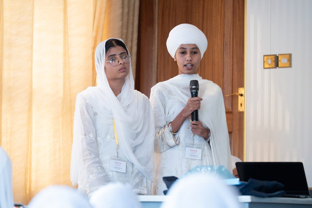 Students speaking to the main group